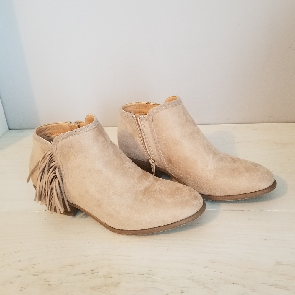 Tan fringe booties
